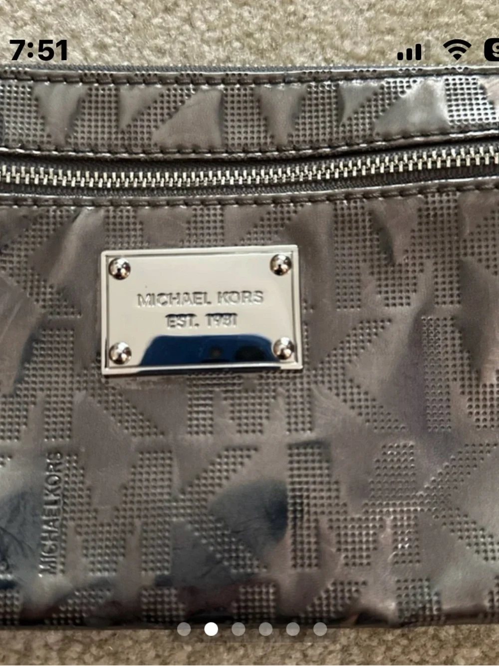 Michael Kors Metallic Gray MK Embossed Wristlet